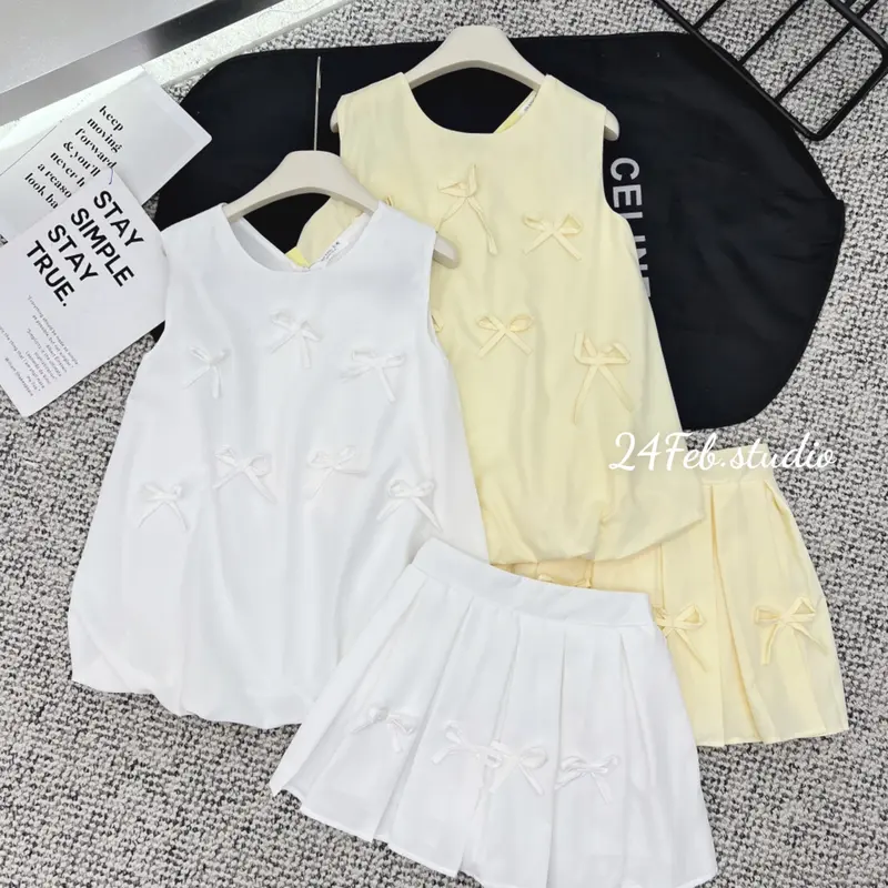 [SET55] Set áo ba lỗ kèm chân váy xếp li dáng ngắn đính nơ phong cách tiểu thư Hàn Quốc 6