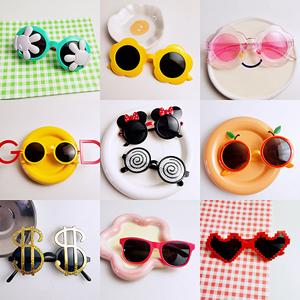 แว่นกันแดดเด็ก แฟชั่น สำหรับเด็กทารกและเด็กผู้หญิง น่ารัก แว่นกันแดด กันแดด กรอบแว่นตาของเล่นการ์ตูน