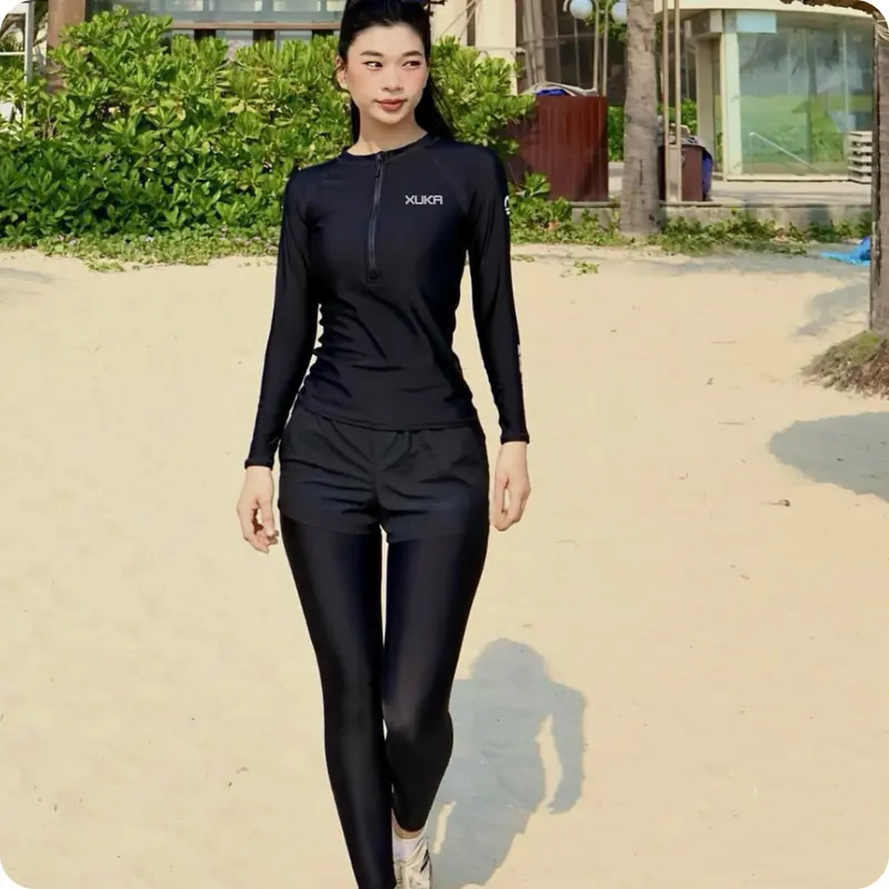 Đồ bơi nữ kín đáo, đồ bơi 2 mảnh tay dài quần dài che nắng kiểu dáng thể thao năng dộng Xuka 1