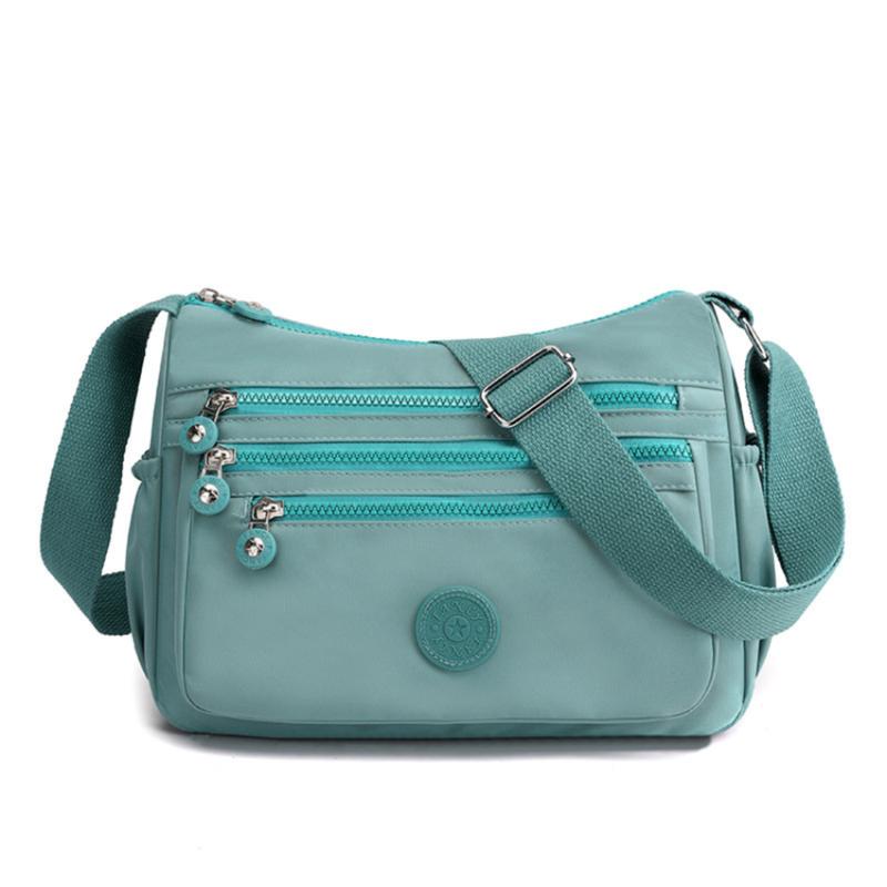 Túi giỏ xách đeo chéo 11 ngăn size 29cm chất liệu vải dù chống nước chống xước cao cấp phù hợp đi chơi đi chợ đi làm hay đi dạo phố TX085