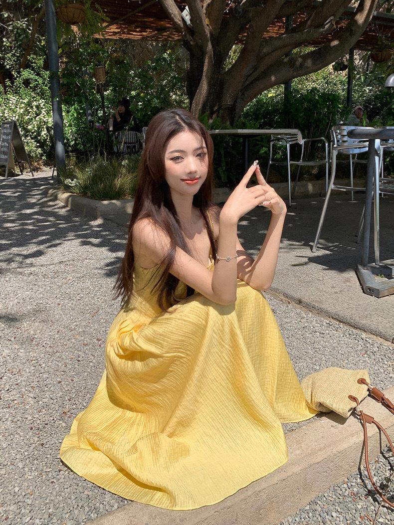 Product Introduction of French style short yellow camisole dress, women's waist cinching temperament long skirt, beach vacation dress 2