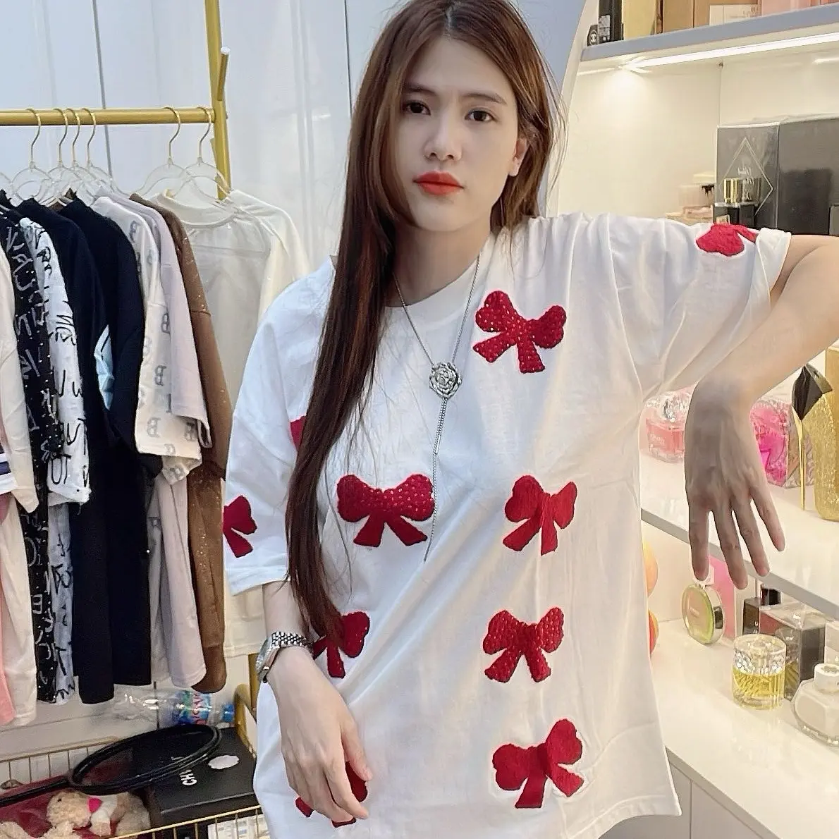 Áo phông nữ cottton khô nơ cổ tròn phom rộng chùm mông