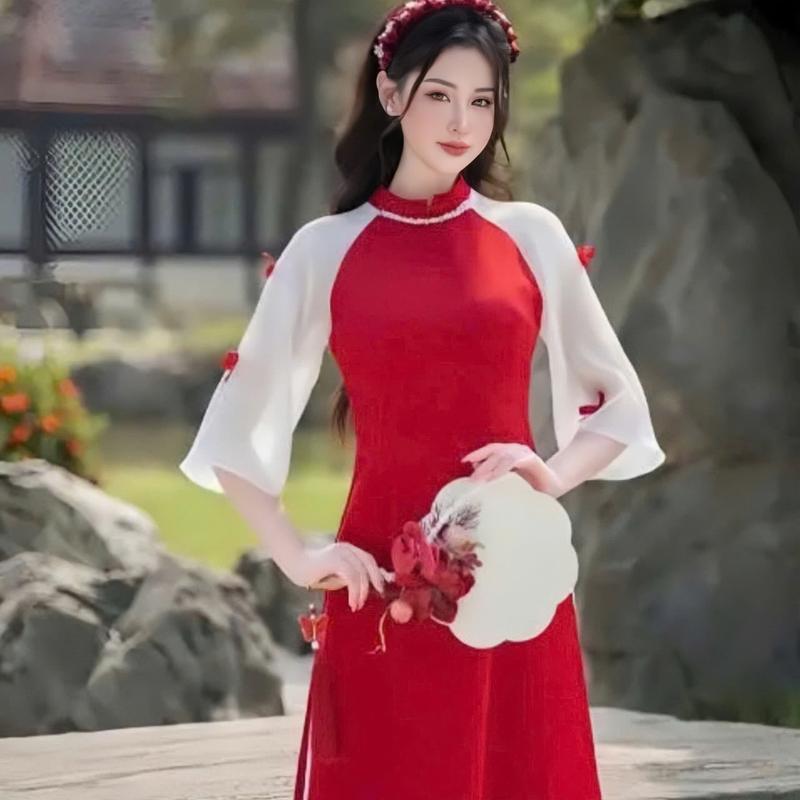 Product Introduction of Set áo dài cách tân áo tuyết nhung phối tơ cổ cao đính nơ tay lỡ xẻ tà mix quần dài ống rộng xinh xắn thích hợp cho các nàng diện đi chơi,đi lễ. Women top 17