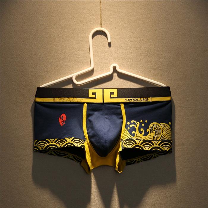 Product Introduction of 2pcs/lot men's cartoon underwear tight-fitting low-waisted cotton U convex boyshort youth breathable sports boxers 2