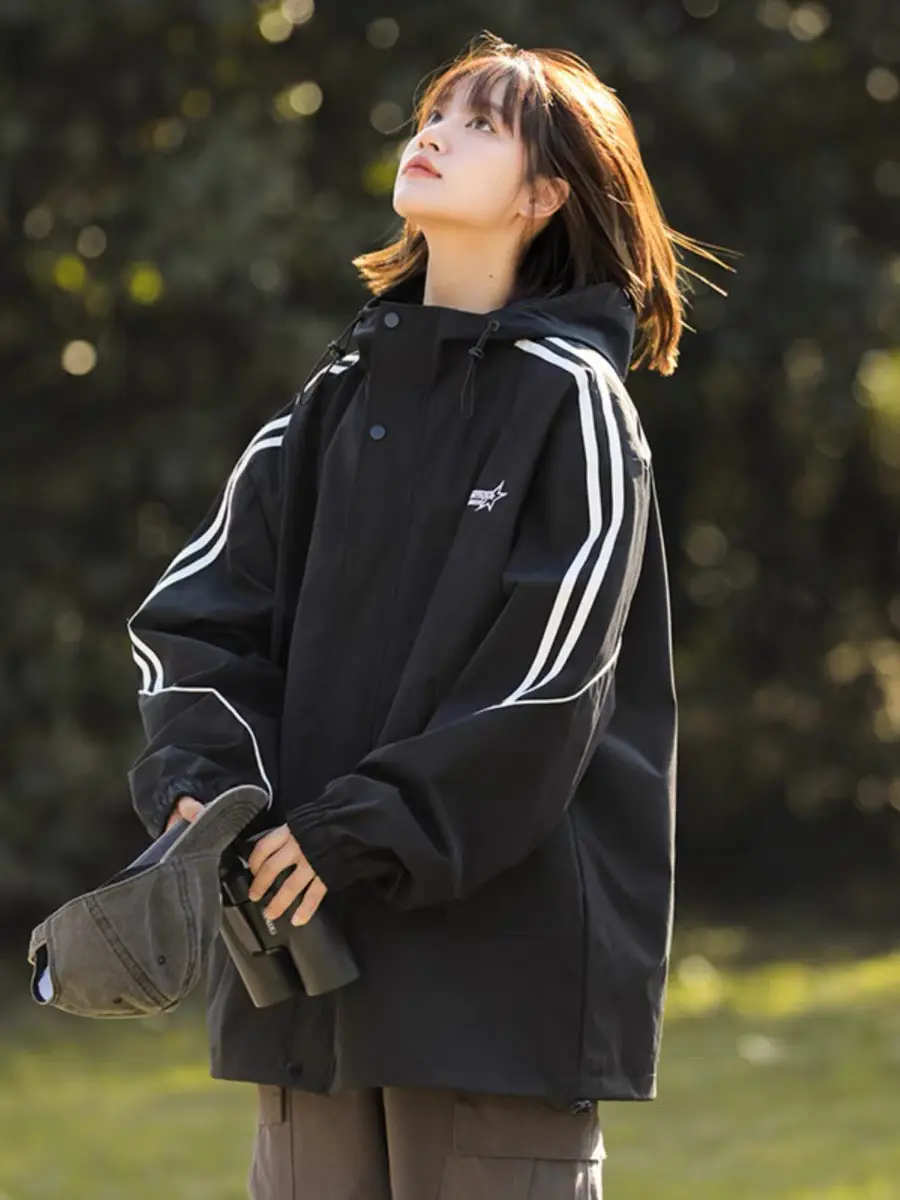 Áo khoác gió 2 lớp chống nước - Áo khoác gió nam nữ mũ to trùm đầu áo khoác sọc thu đông 2025 Jacket Ong Top thông thường khóa kéo áogió áogió julido