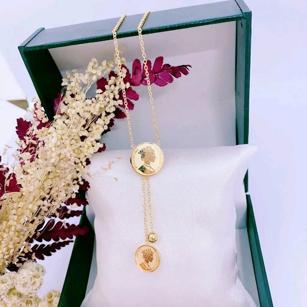 Kalung Titanium wanita gold motif koin