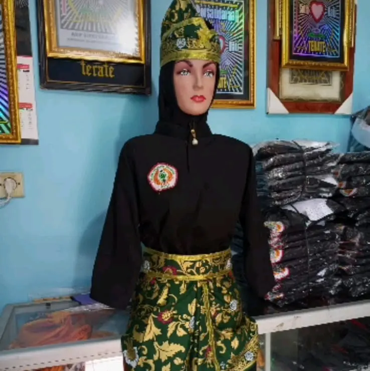 Assesoris Pencak Silat Hijau Emas