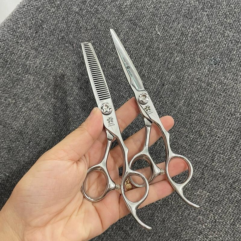 Kéo cắt tóc SAKURA 6.0 Tay phải Thép Nhật cao cấp mẫu màu bạc nội địa trung