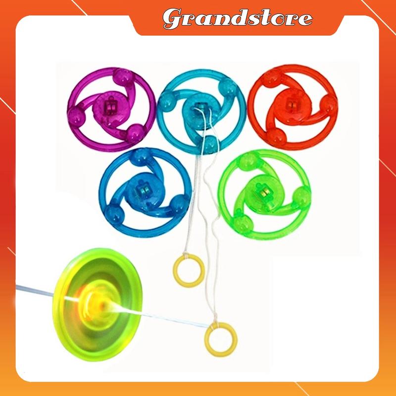 Con quay spinner có đèn led xoay vòng tròn phát sáng giựt giật kéo dây bánh đà hồi chuyển đồ chơi tuổi thơ cho bé trẻ em