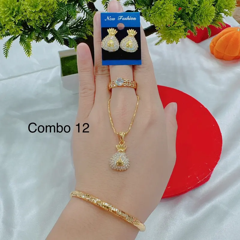 Bộ dây chuyền 4 món dây lắc nhẫn và bông tai( phụ nữ) Cao Su 2