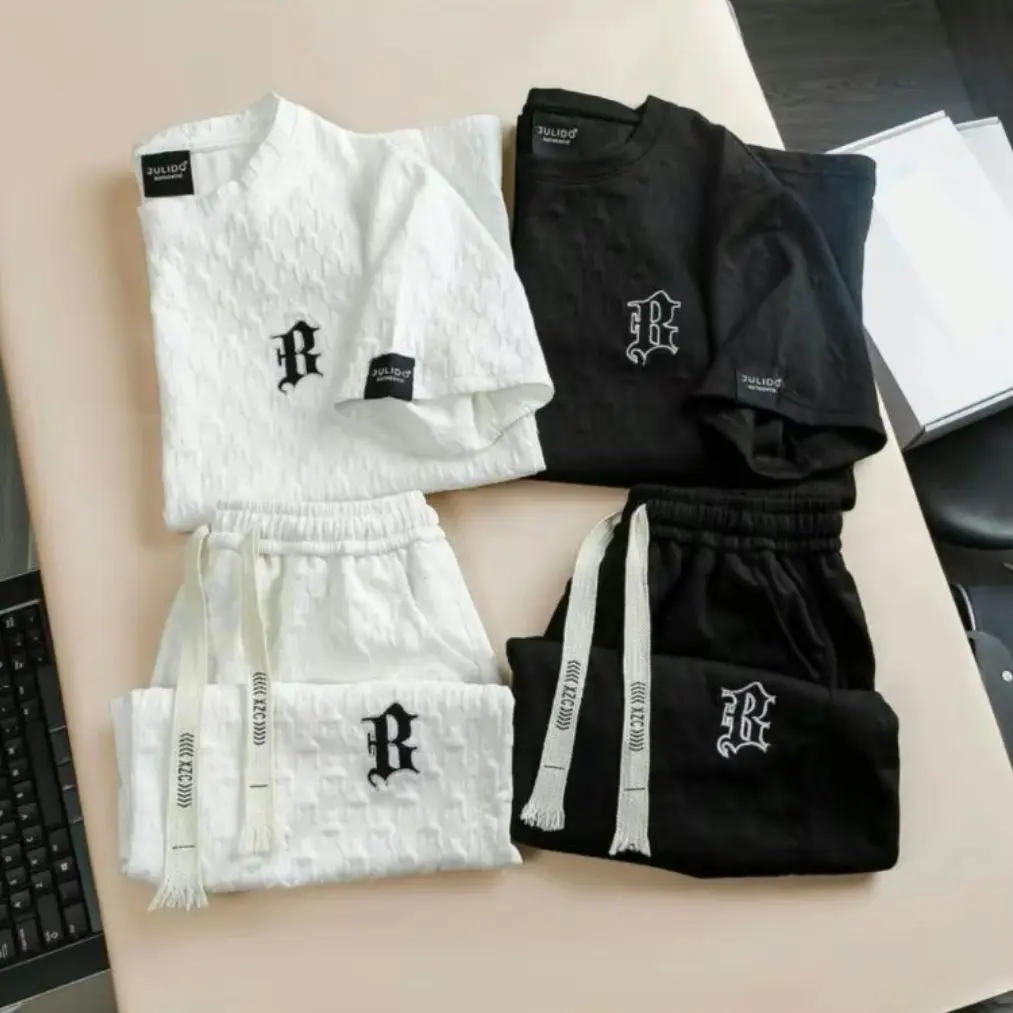 Bộ Quần Áo Thể Thao Chất Xốp Đen Trắng Thấm Hút Mồ Hôi Cao Cấp