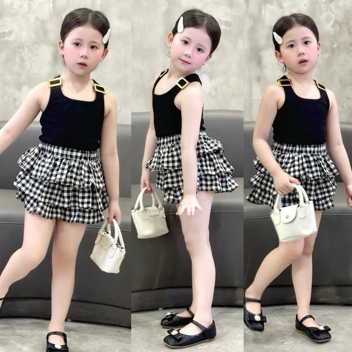 Sét chân váy karo 3 tầng có quần bên trong + áo ba lỗ đen có phụ kiện cho bé gái