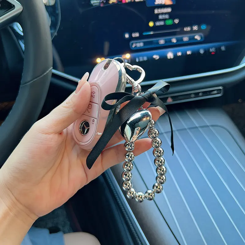 Decorative creative bow, silver bead string, heart-shaped keychain, internet famous car key, luggage pendant, exquisite female decoration