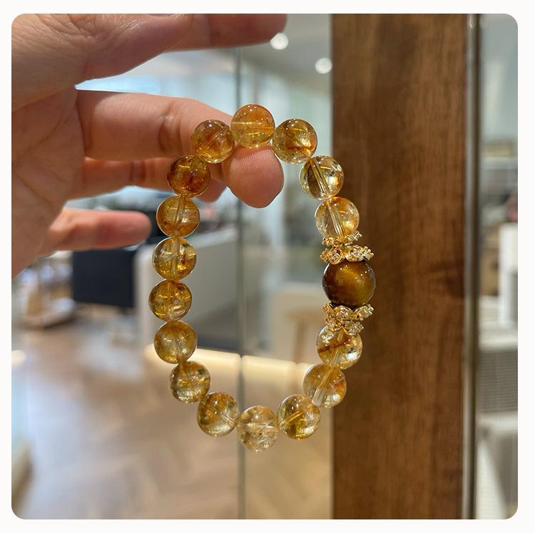 Product Introduction of Natural Yellow Pagoda Crystal Tiger Eye Stone Unique Niche Wealth-Attracting Bracelet for Women Large Round Beads Accessories Wholesale from Manufacturer 1