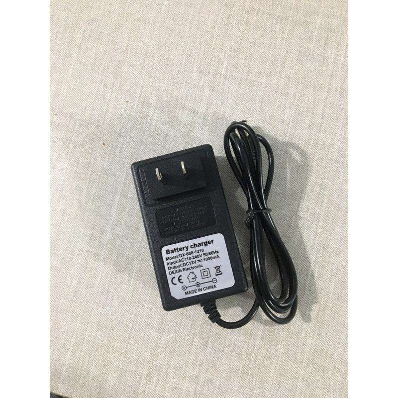 (SẠC NHANH)(Hàng tiêu chuẩn châu âu)Sạc xe điện trẻ em, sạc xe ô tô điện trẻ em 12v 1000mah có đèn báo 7