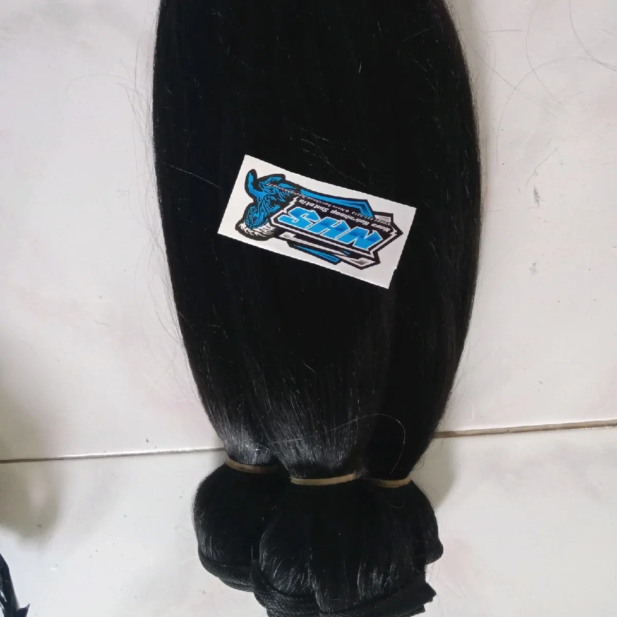 rambut sinteti per iket