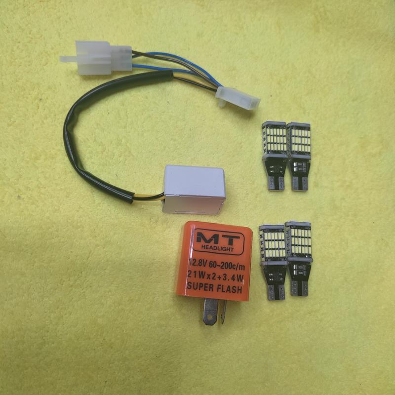 VG59 Combo hazard cho xe máy : mạch hazard + 4 bóng LED T15 + cục chớp điện tử chỉnh tốc độ nhanh chậm xi nhan gắn cho Wave Sirius Ex135 Vision AB EX15 Sonic Winner Future Phụ Kiện Đèn Led0 155