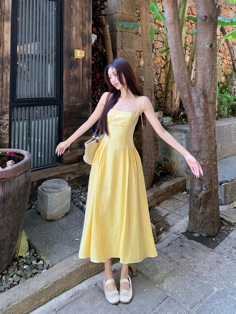Product Introduction of French style short yellow camisole dress, women's waist cinching temperament long skirt, beach vacation dress 9