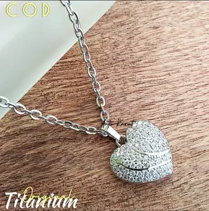 KALUNG TITANIUM RANTAI NURI SILVER PLUS LIONTIN LOVE GARIS DUA TERBARU DAN TERMURAH ANTI KARAT ANTI LUNTUR ANTI ALERGI