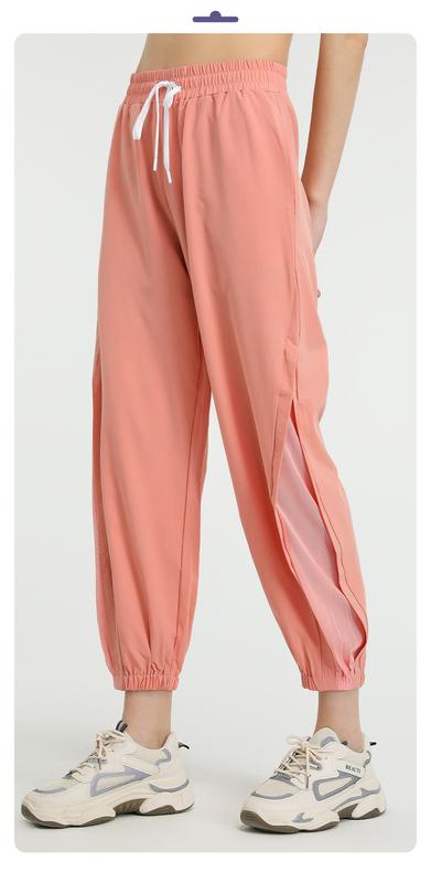 Product Introduction of Loose high-waisted quick-drying pants European and American mesh quick-drying yoga trousers running sports tied feet large-size fitness pants women 2