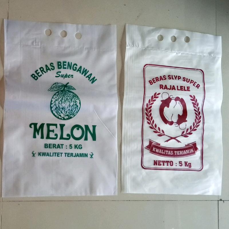 50 pcs plastik beras 5kg  dgn tentengan gambar melon dan rajalele (isi 50pcs) 0