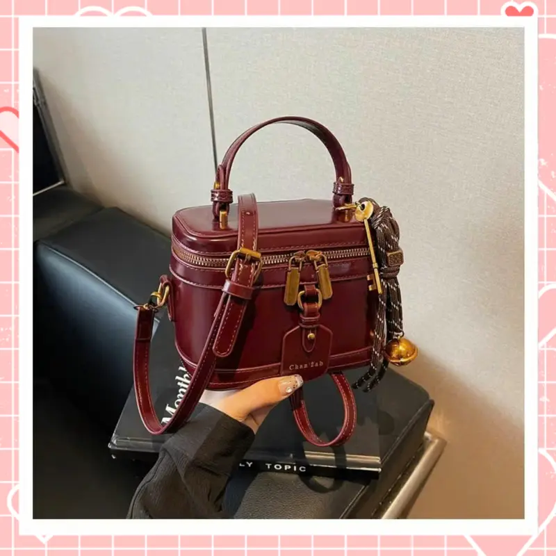 Túi xách nữ đeo chéo túi cốp nữ da trơn kèm chuông thời trang sang chảnh K254 Bag Nhung 0