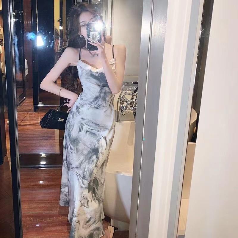 Product Introduction of Elegant Lady High Waist Sling Dress Summer 2025 New French Backless Design Chic Midi Dress 1