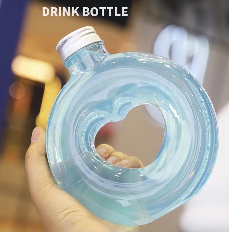 Product Introduction of 5/10pcs New Heart Water Bottle Food-graded Transparent PET Milk Tea Shop Cup Wedding Party Gift Cola Juice Drinks Bottles 500ML 12
