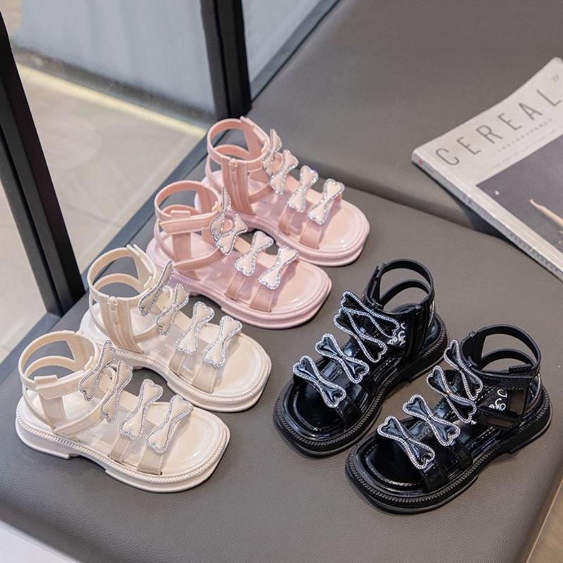 Sandal chiến binh nơ nhũ cho bé gái từ 5 đến 14 tuổi chất liệu da bóng siêu xinh