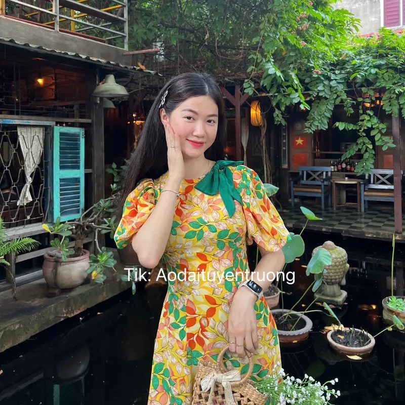 Bộ áo dài hoa lá đính nơ 2 màu 6