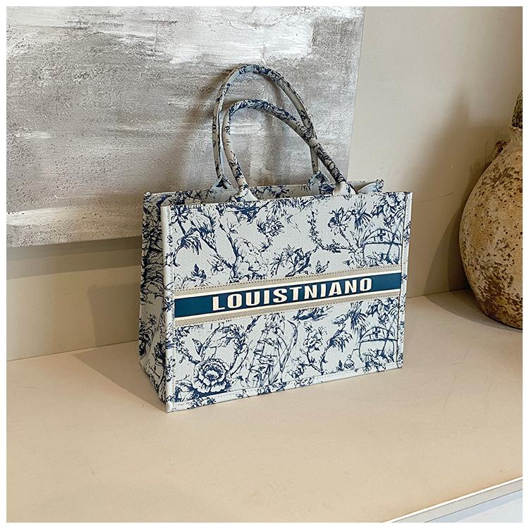 Product Introduction of Trendy Large Capacity Tote Bag for Women 2025 New Fashion Canvas Shoulder Handbag Tote Bag Niche Handbag Wholesale 16