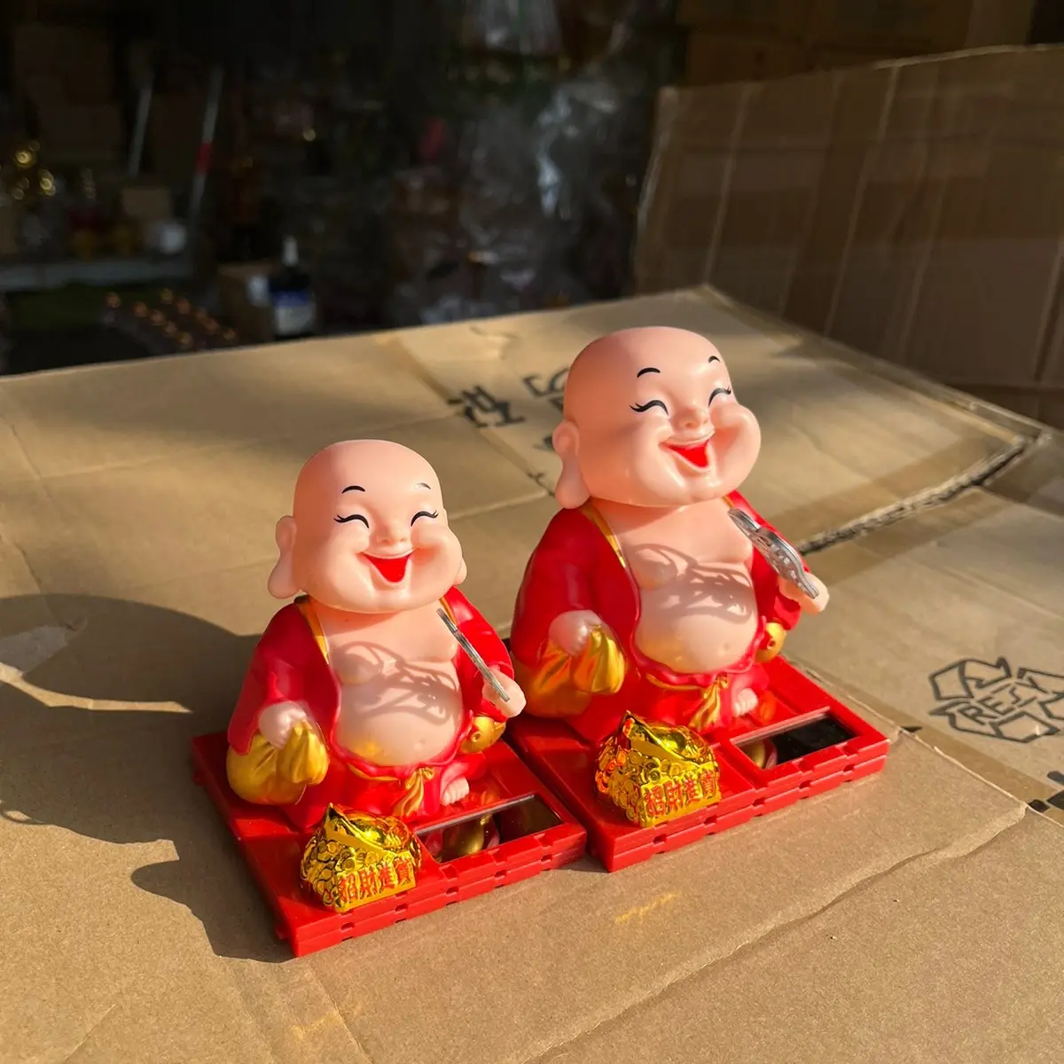 Tượng thần tài di lặc vẫy quạt