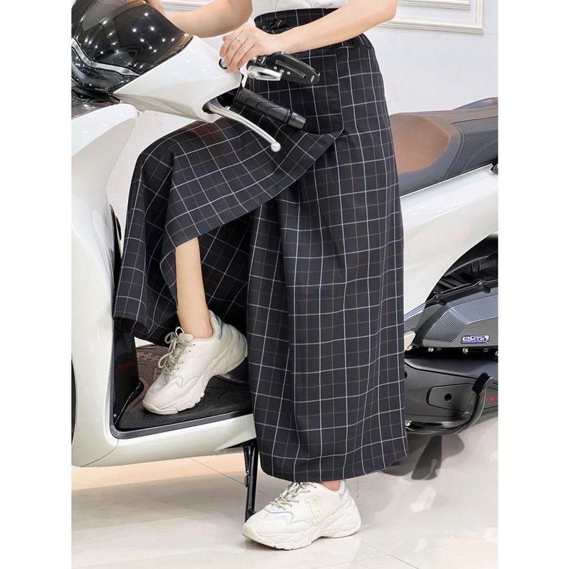 Váy chống nắng kaki freeSize xẻ tà có túi phía trước miếng dán kết hợp nút bấm  dưới tà váy có nút bấm