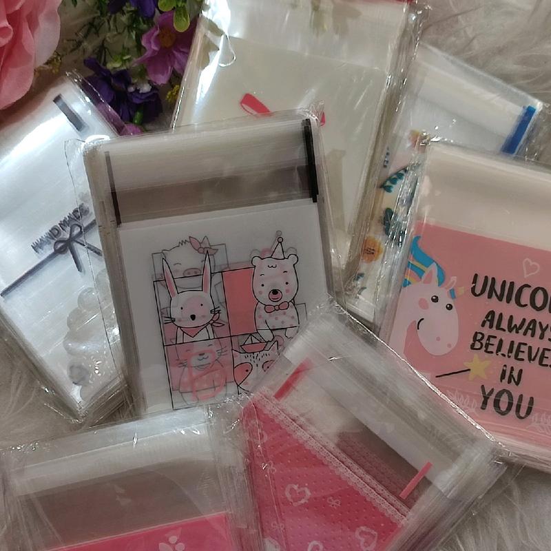 1 pack isi 100pcs Plastik Kue Cookies Bag Fancy Motif Lucu Menarik Modern Karakter Kartun Bunga Polos Doff Bening 7x7 Kantong kemasan handmade motif lucu cat love pink flower flowy hati waru pig rabbit pita ribbon permen candy aksesoris opp ada perekat 1