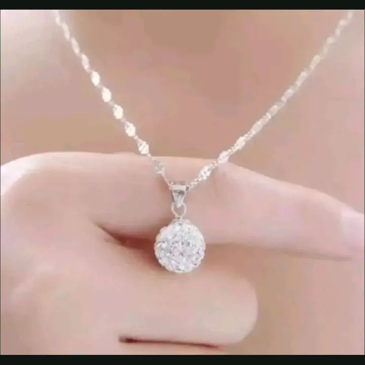 kalung melintir free liontin bulat kristal titanium Perempuan