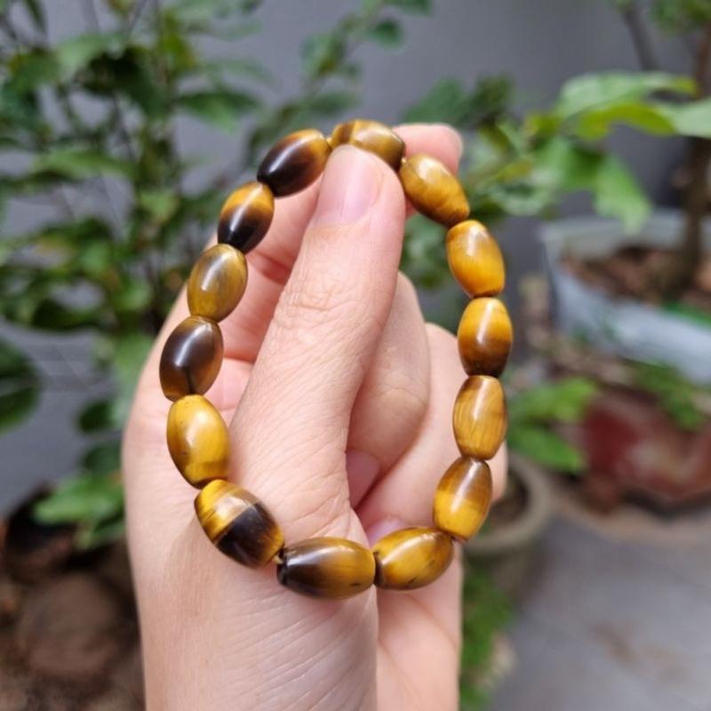Vòng tay lu thống màu vàng nâu M.Hổ size 8 li 0