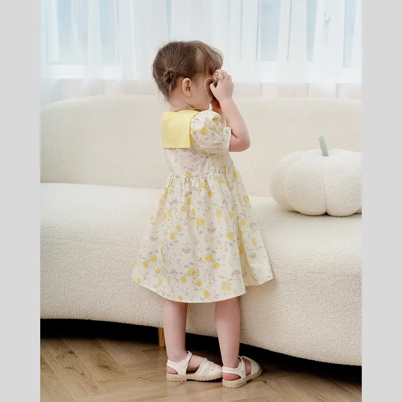 Váy bé gái tay bồng chất thô cotton họa tiết hoa phối dây vàng 3