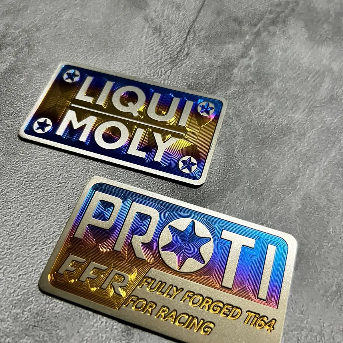 Emblem hugger titanium