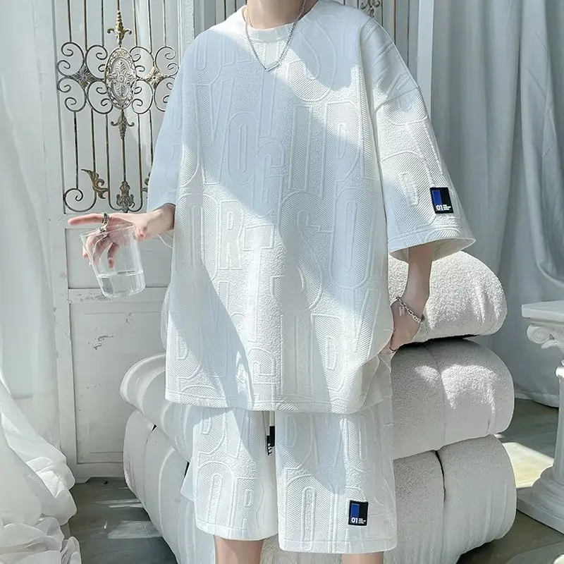 Bộ quần áo nam mùa hè chất xốp vân chữ nổi Pahito