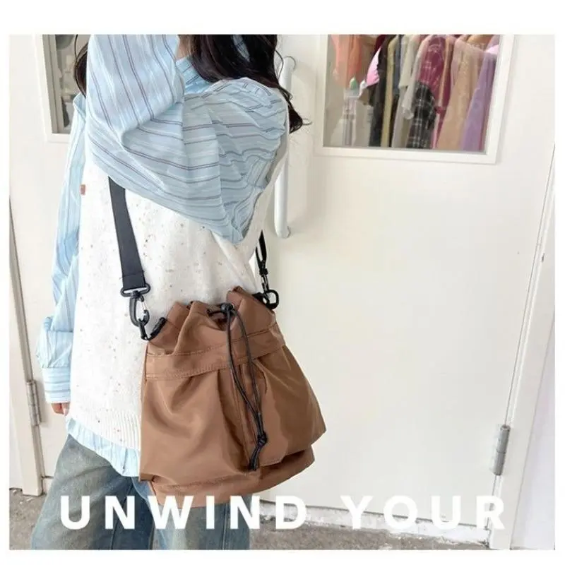 Hot New Korean Style 2025 Fashion Women's Bag Nylon Drawstring Bucket Bag Versatile Handheld Shoulder Messenger Bag Casual female