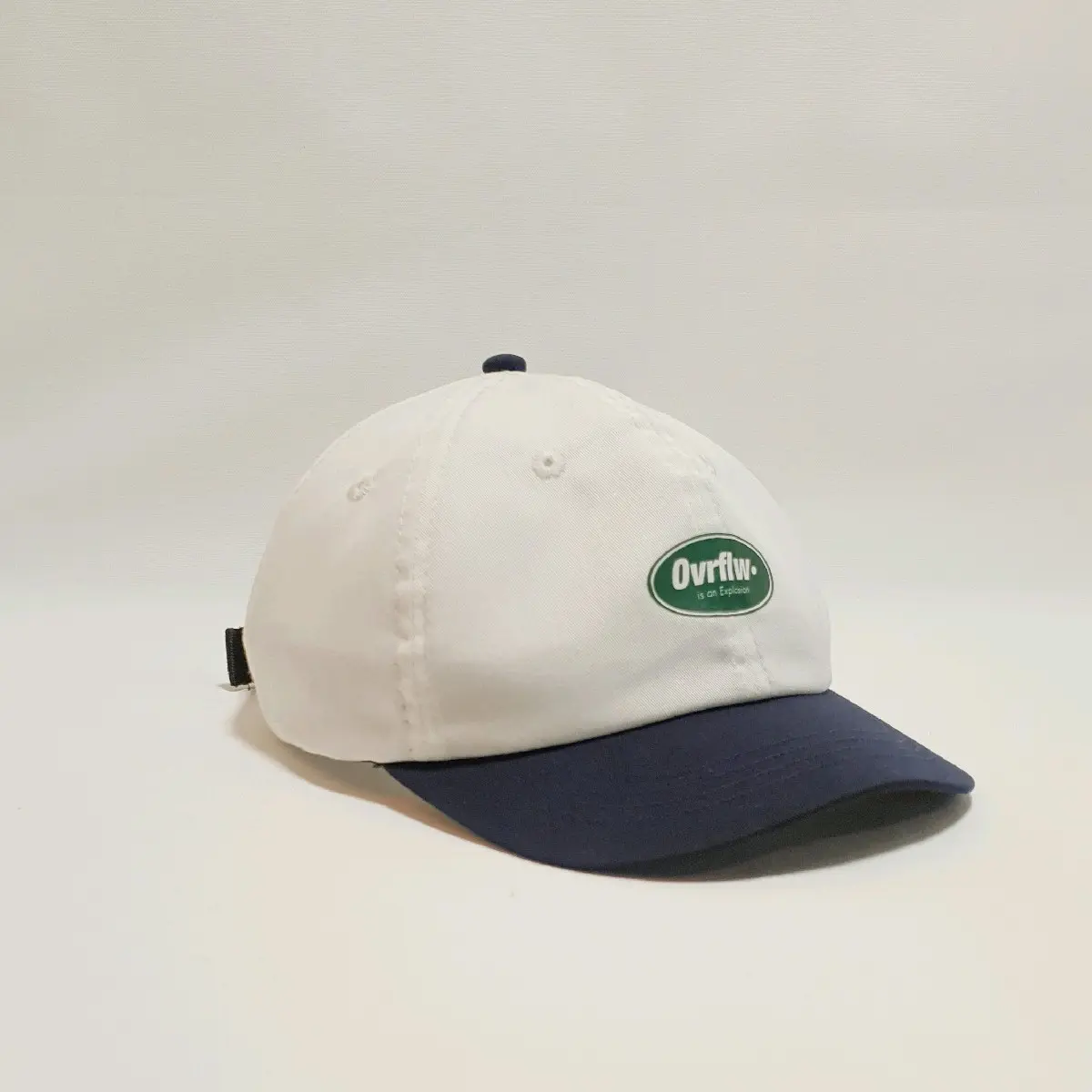 Topi Six Panel Short White Navy Combine