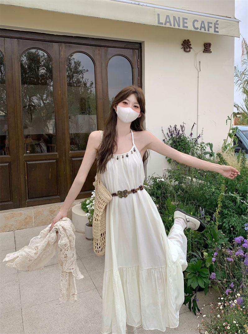 Product Introduction of Simia Hollow Suspender Dress Tassel Long Dress Two-piece Set Sunscreen Cardigan Mori 11