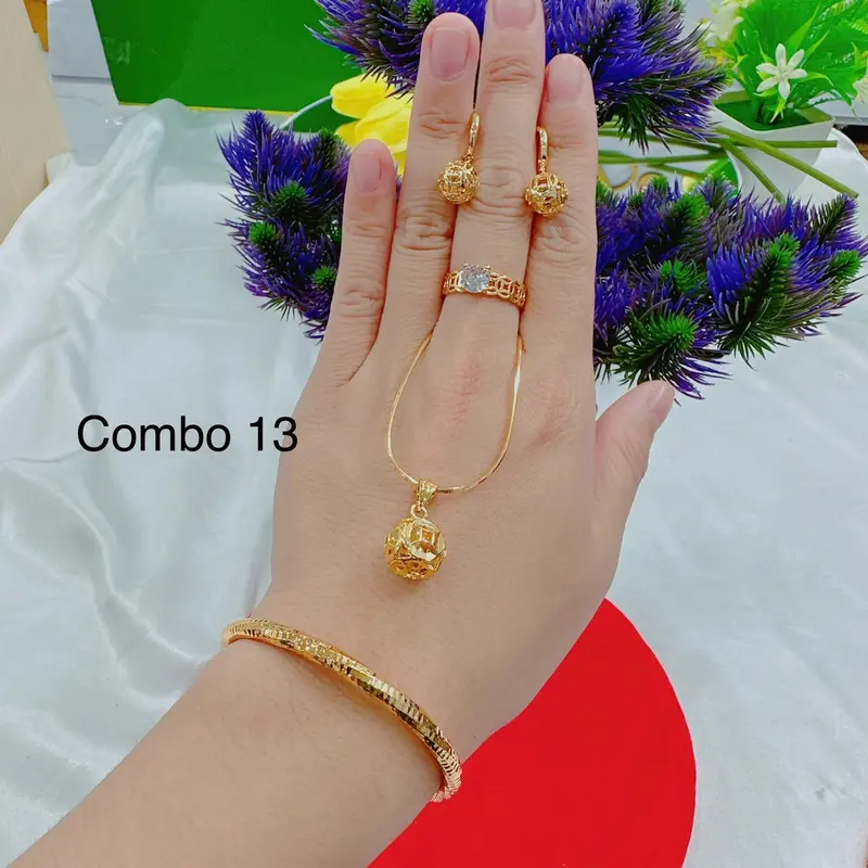 Bộ dây chuyền 4 món dây lắc nhẫn và bông tai( phụ nữ) Cao Su 8