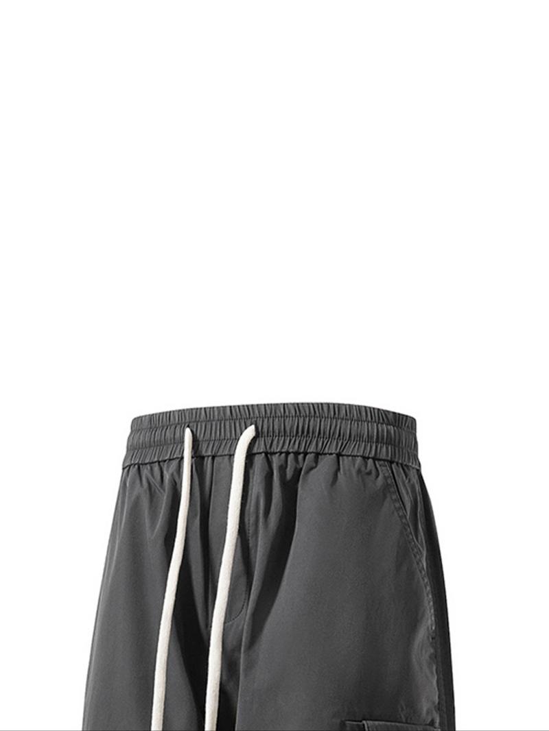 Product Introduction of Men's Solid Pocket Drawstring Waist Cargo Pants, Regular Fit Casual Fashion Trousers for Outdoor Wear, Men's Bottoms for Spring & Fall 3