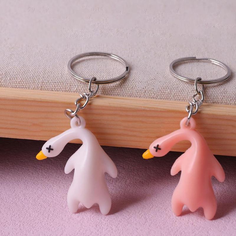 Product Introduction of Funny Color Change Duck Bag Pendant UV Simulation Roast Duck Car Pendants Keyrings For Handbag Accessories Gift 18