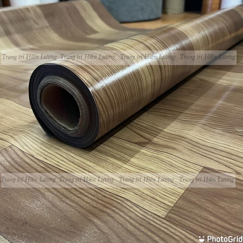 Cuộn 10m2 simili trải sàn nhà màu gỗ nâu đậm dày 0,4mm