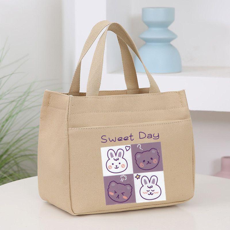 Product Introduction of New Canvas Handbag Large Capacity Simple Office Worker Student All-Match Lunch Box Mummy Work Bento Canvas Bag 9