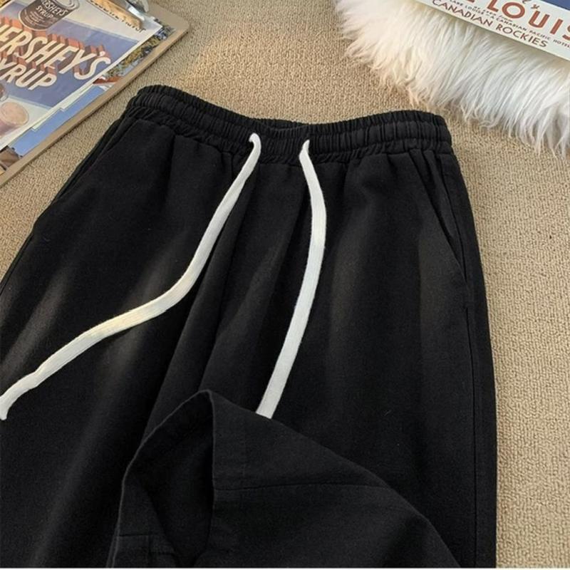 Quần Dài nam nữ ống suông chất vài ka ki mềm mịn cạp chun có dây rút Menswear Thun 9