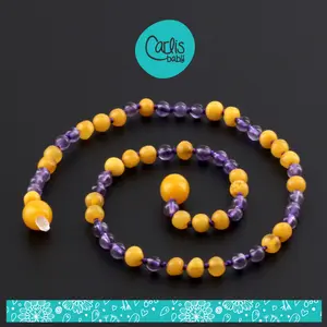 Kalung Amber Tumbuh Gigi Bayi dengan Amethyst By Carlis Baby. AGL37
