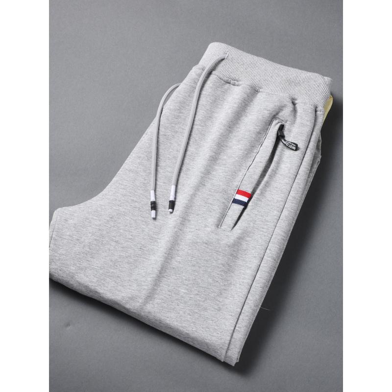 Quần Jogger Nam Nữ Trơn Basic Chất Vải Da Cá Phong Cách Thể Thao Cá Tính Năng Động 3